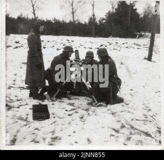 Wehrmacht Troops of the Grossdeutschland Division with an 8cm Mortar at a training ground in Germany 1942 Stock Photo