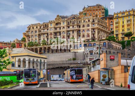 Historic Miramare Palace (holiday flats) above the harbour with bus and metro station, Genoa, Liguria, Mediterranean Sea, Mediterranean Coast, Italy Stock Photo