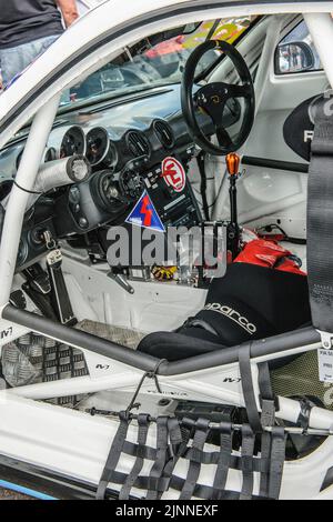 View inside cockpit of racing car Porsche Cayman R in grid lane in front of start of car race, Nuerbirgring, Nuerburg, Rhineland-Palatinate, Germany Stock Photo