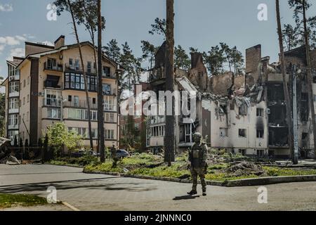 Buildings shot up in Irpin, May 10, 2022. Since February 24th, 2022, after the invasion of Russian forces, there has been a war in Ukraine. The village of Irpin near the capital Kyiv, which was occupied by Russian soldiers in March 2022, was 40 percent destroyed. Stock Photo