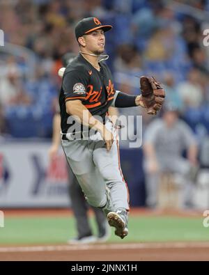 Baltimore Orioles third baseman Ramon Urias throws to first after ...