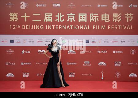 Beijing, China. 12th Aug, 2022. Actress Yao Chen poses for a photo on the red carpet of the 12th Beijing International Film Festival in Beijing, capital of China, Aug. 12, 2022. Credit: Chen Zhonghao/Xinhua/Alamy Live News Stock Photo