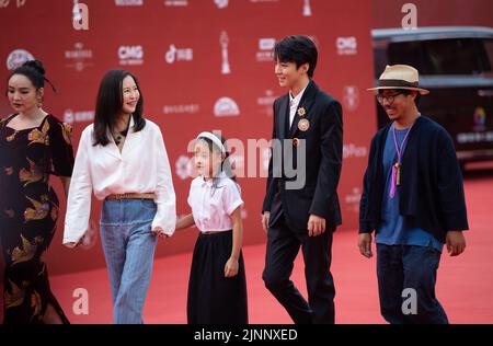 Beijing, China. 12th Aug, 2022. Cast members of the film 'The Fallen Bridge' walk on the red carpet of the 12th Beijing International Film Festival in Beijing, capital of China, Aug. 12, 2022. Credit: Chen Zhonghao/Xinhua/Alamy Live News Stock Photo