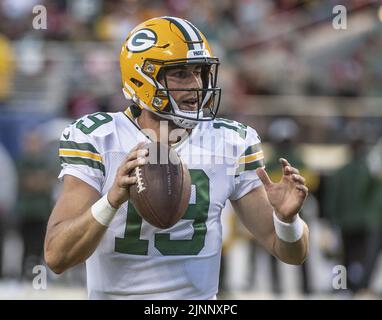 Green Bay Packers quarterback Danny Etling (19) runs for a