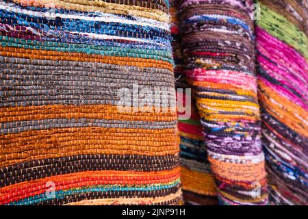Colorful raw fabric in a souvenir shop in Athens Stock Photo
