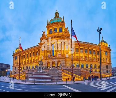 PRAGUE, CZECH REPUBLIC - MARCH 6, 2022: The evening panorama of brightly illuminated National Museum building from Wenceslas Square, on March 6 in Pra Stock Photo