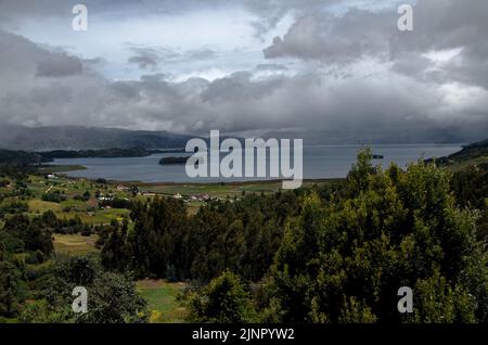 Panoramic view of a lake with low clouds Stock Photo