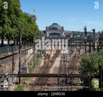 electrifed railway tracks lead to the Gare de Limoges-Bénédictins, a famous railway station in Limoges France Stock Photo