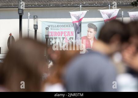 Bad Nauheim, Germany. 13th Aug, 2022. A poster advertises the European Elvis Festival. The festival is being held in Bad Nauheim for the 20th time this year. Presley was stationed as a soldier in Friedberg from October 1958 to March 1960 and lived in Bad Nauheim. Credit: Hannes P. Albert/dpa/Alamy Live News Stock Photo