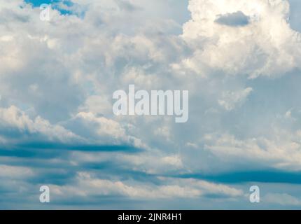Dark rain clouds in grey sky Stock Photo