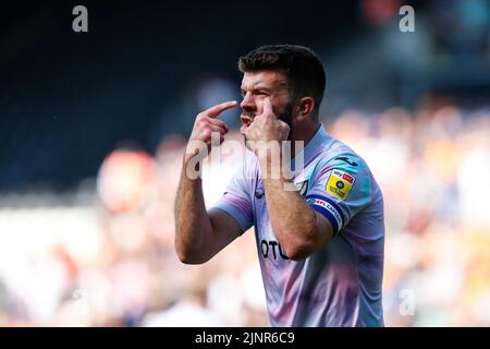 Hull, UK. 13th Aug, 2022. Grant Hanley #5 of Norwich City reacts at the linesman in Hull, United Kingdom on 8/13/2022. (Photo by Ben Early/News Images/Sipa USA) Credit: Sipa USA/Alamy Live News Stock Photo