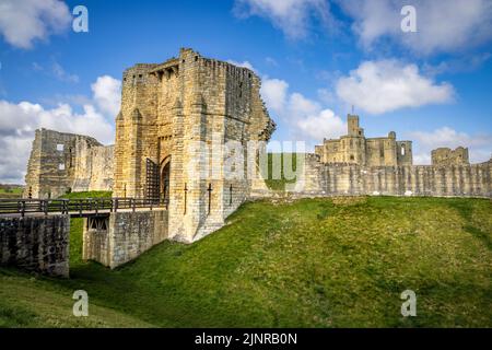 The bridge and entrance gate to Warkworth Castle, Northumberland, England Stock Photo