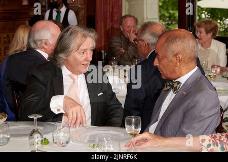 Stephen Barlow; Sir Ken Olisa at Lunch for HRH The Duchess of Cornwall’s 75th birthday Stock Photo