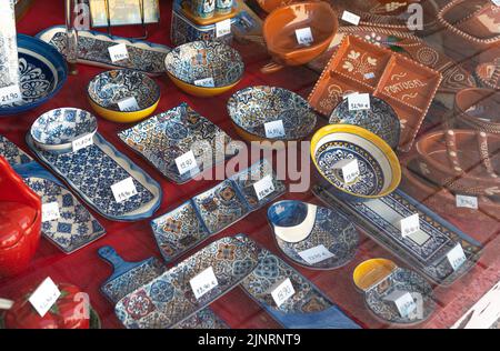 Souvenirs Background with colorful Portuguese blue ceramics Stock Photo