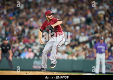 August 12 2022: Arizona pitcher Chris Devenski (32) throws a pitch during the game with Saint Louis Cardinals and Colorado Rockies held at Coors Field in Denver Co. David Seelig/Cal Sport Medi Stock Photo