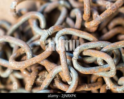 old rusted steel chains. Concept of antiquity and false security Stock Photo