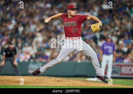 August 12 2022: Arizona pitcher Kevin Ginkel (37) throws a pitch during the game with Saint Louis Cardinals and Colorado Rockies held at Coors Field in Denver Co. David Seelig/Cal Sport Medi Stock Photo