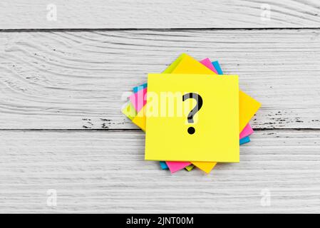 Question mark on adhesive paper note Stock Photo