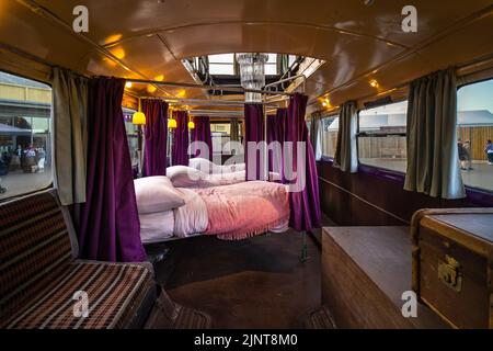 London, UK - 10 June 2022:  The Knight Bus of The Prisoner of Azkaban movie from inside; Comfortable travel bus with beds inside Stock Photo