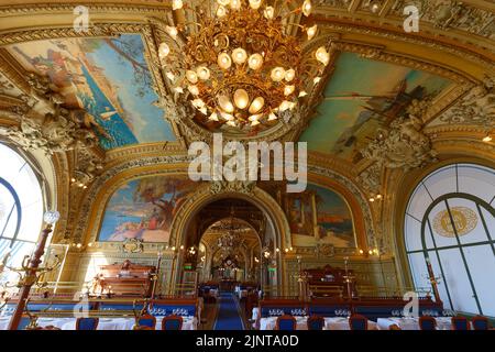 Le Train Bleu is a famous restaurant located in the hall of the Gare de Lyon railway station in Paris . Stock Photo