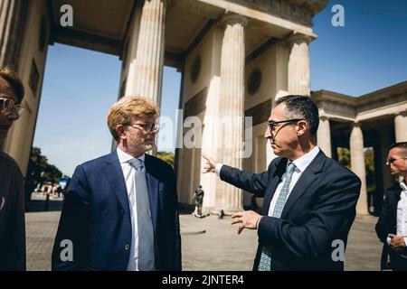 The Federal Minister of Food and Agriculture, Cem Oezdemir, and the French Minister of Agriculture and Food Sovereignty, Marc Fesneau, before the Brandenburg goal in Berlin on July 19, 2022. Stock Photo