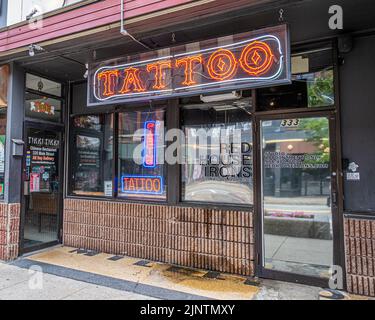 Buildings in downtown Fitchburg, Massachusetts - Tattoo parlor Stock Photo