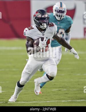Tampa, United States. 13th Aug, 2022. Tampa Bay Buccaneers' Ke'Shawn Vaughn (21) carries the ball during the first half of their preseason game against the Miami Dolphins at Raymond James Stadium in Tampa, Florida on Saturday, August 13, 2022. Photo by Steve Nesius/UPI Credit: UPI/Alamy Live News Stock Photo
