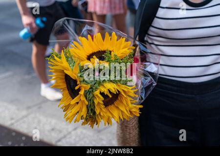 New York, USA. 13th Aug, 2022. Protesters rally against Russian aggression towards Ukraine on Times Square in New York on August 13, 2022. (Photo by Lev Radin/Sipa USA) Credit: Sipa USA/Alamy Live News Stock Photo