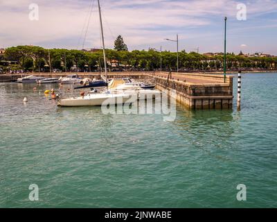 Peschiera del Garda town. Little town Harbour with colorful boats. Italian Garda lake, Veneto region of northern Italy - Charming fortified citadel
