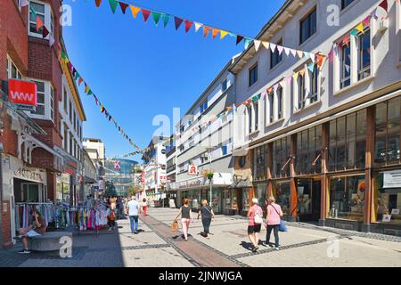 Kaiserslautern, Germany - August 2022: Shopping street called 'Fackelstrasse' with people in city center Stock Photo