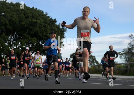 Competitors run up Heartbreak Hill during the 2022 City to Surf on August 14, 2022 in Sydney, Australia. Stock Photo