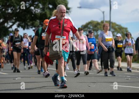 Competitors make their way up Heartbreak Hill during the 2022 City to Surf on August 14, 2022 in Sydney, Australia. Stock Photo