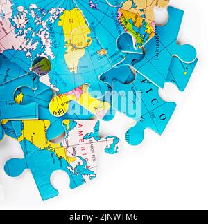 Concept of Globalization. Earth puzzle on white background Stock Photo