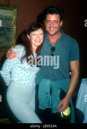 Los Angeles, California, USA 18th June 1996 Actress Frances Fisher and Actor Judd Nelson attend Pool AiID 1996 benefiting Aids Project Los Angeles at Hollywood Athletic Club on June 18, 1996 in Los Angeles, California, USA. Photo by Barry King/Alamy Stock Photo Stock Photo