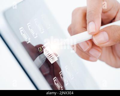 Document management. Cloud computing technology. Closeup document file information icons and check mark on tablet computer screen, choosing by digital Stock Photo