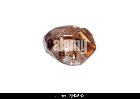 Natural rough uncut brown zircon gemstone crystal on white background Stock Photo