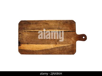 Old cracked wooden cutting board isolated on white background. Top view Stock Photo