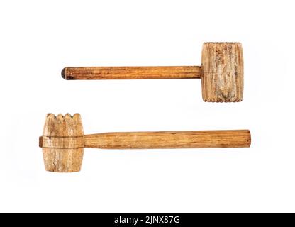 Two old wooden meat hammers isolated on white background Stock Photo