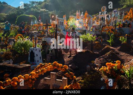 Mixtec indigenous people take part in the Day of the Dead celebrations at a cemetery in Xalpatláhuac, Guerrero, Mexico. Stock Photo