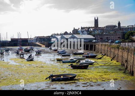 Penzance,Cornwall,13th August 2022,People enjoy the glorious sunshine in Penzance, Cornwall as they strolled along the Promenade. The temperature was Stock Photo