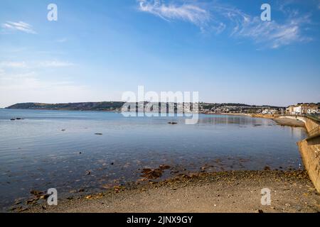 Penzance,Cornwall,13th August 2022,People enjoy the glorious sunshine in Penzance, Cornwall as they strolled along the Promenade. The temperature was Stock Photo