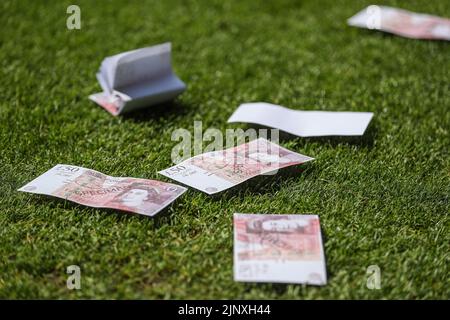 West Ham fans throw fake money at Jesse Lingard #11 of Nottingham Forest Stock Photo