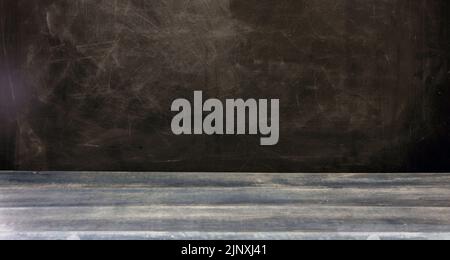 Back to school template. School classroom chalkboard, blank empty black board and blue wooden table Stock Photo