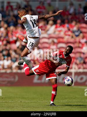 Sheffield United's Max Lowe battles with Middlesbrough's Isaiah Jones during the Sky Bet Championship match at the Riverside Stadium, Middlesbrough. Picture date: Sunday August 14, 2022. Stock Photo