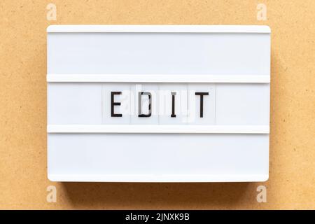 Lightbox with word edit on wood background Stock Photo