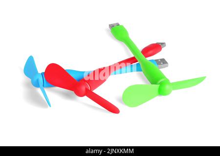 Three Colorful USB Mini Fans on White Background Stock Photo