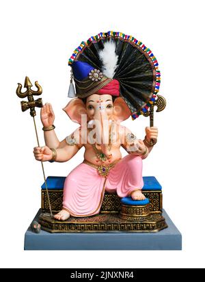 Hindu God Ganesha on white background, Ganesha Idol. Ganesh festival. Stock Photo