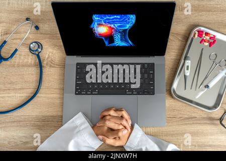 Top view of Dentist looking a x-ray of pain in the mouth Stock Photo