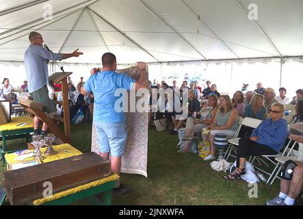 The auction at a church flea market in Dennis, Massachusetts on Cape Cod Stock Photo