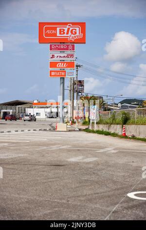 Aeon BIG Express supermarket, sign on pole; Motobu, Okinawa Prefecture, Japan Stock Photo